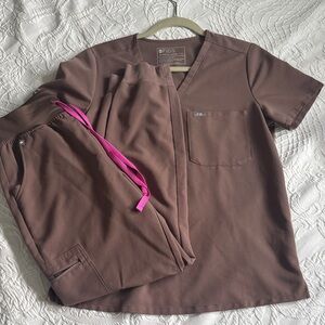 Figs Chocolate Brown Scrub Set with Vibrant Pink Accents